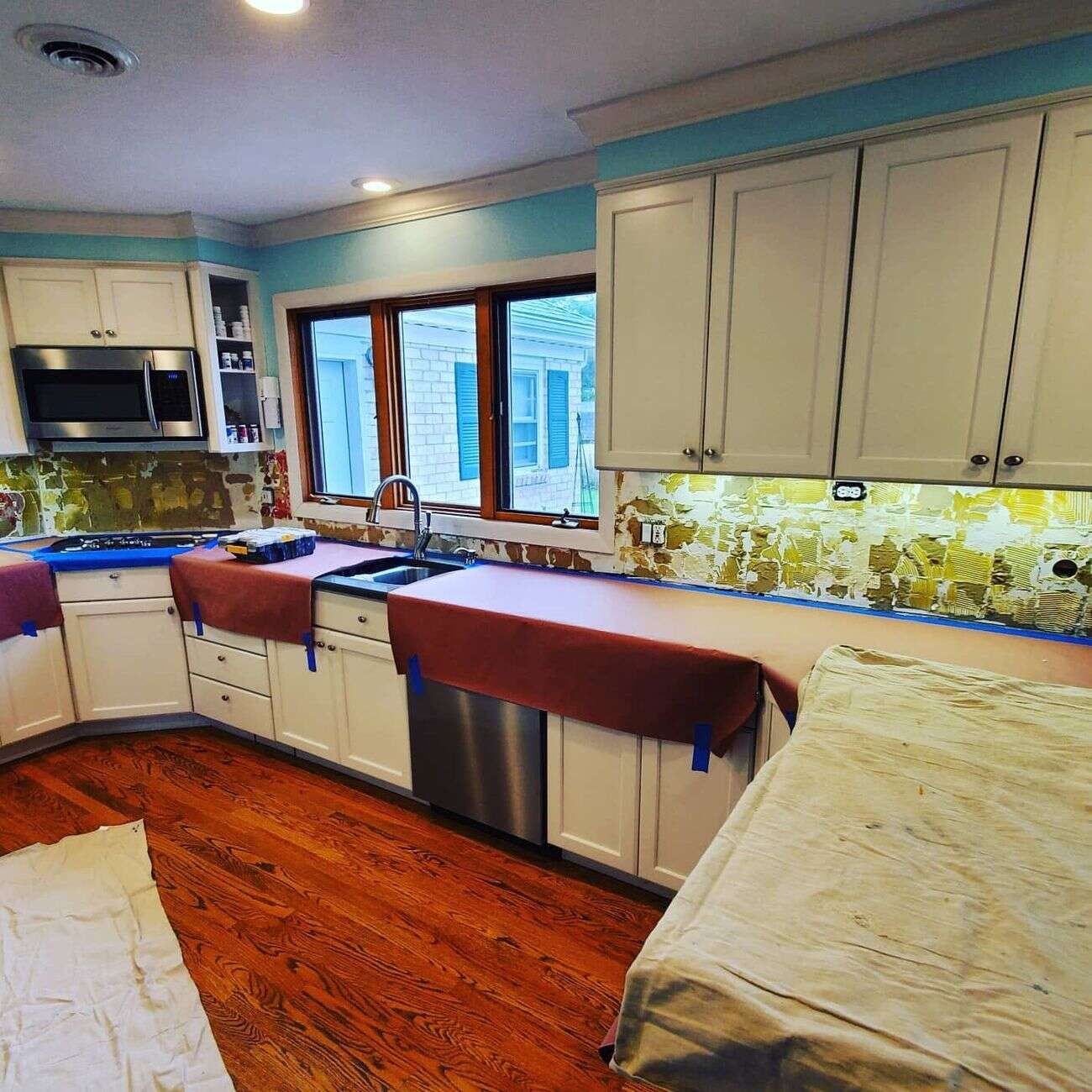 Kitchen with old backsplash removed